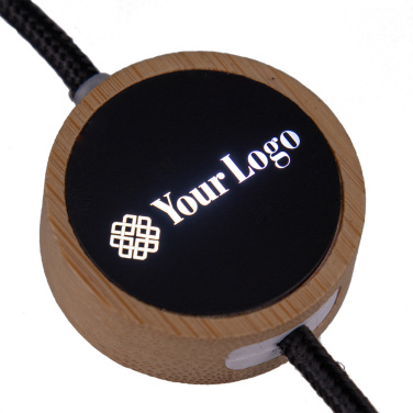 Logotrade Werbegeschenke das Foto: 4in1 langes Holzkabel mit elighted Logo zum Gravieren