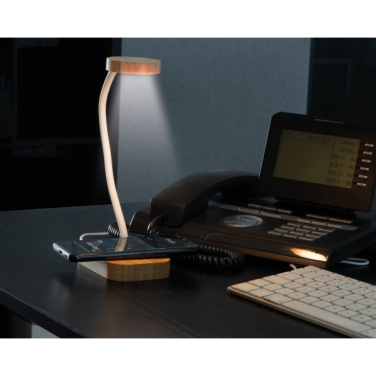 Logotrade reklaamtoote foto: Juhtmeta laadijaga laualampTomsk