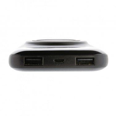 Logotrade profilreklam bild: 10.000 mAh trådlös powerbank med klockladdare